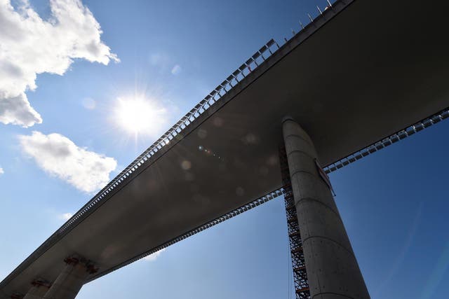 A general view shows the Genoa bridge as engineers perform static testing operations ahead of its inauguration in Genoa