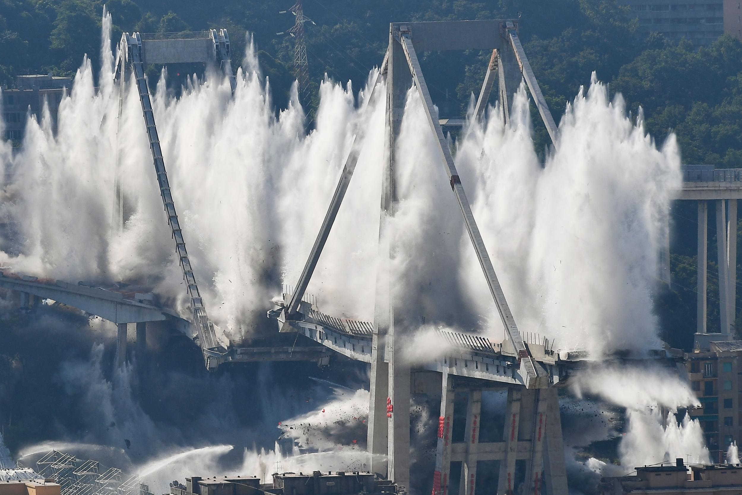 Explosive charges blow up what was left of Genoa’s Morandi motorway bridge in June 2019 almost eleven months after its partial collapse during a storm killed 43 people and injured dozens