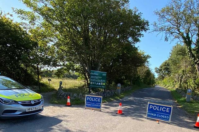 Two bodies have been found in a car at a country park in Dorset