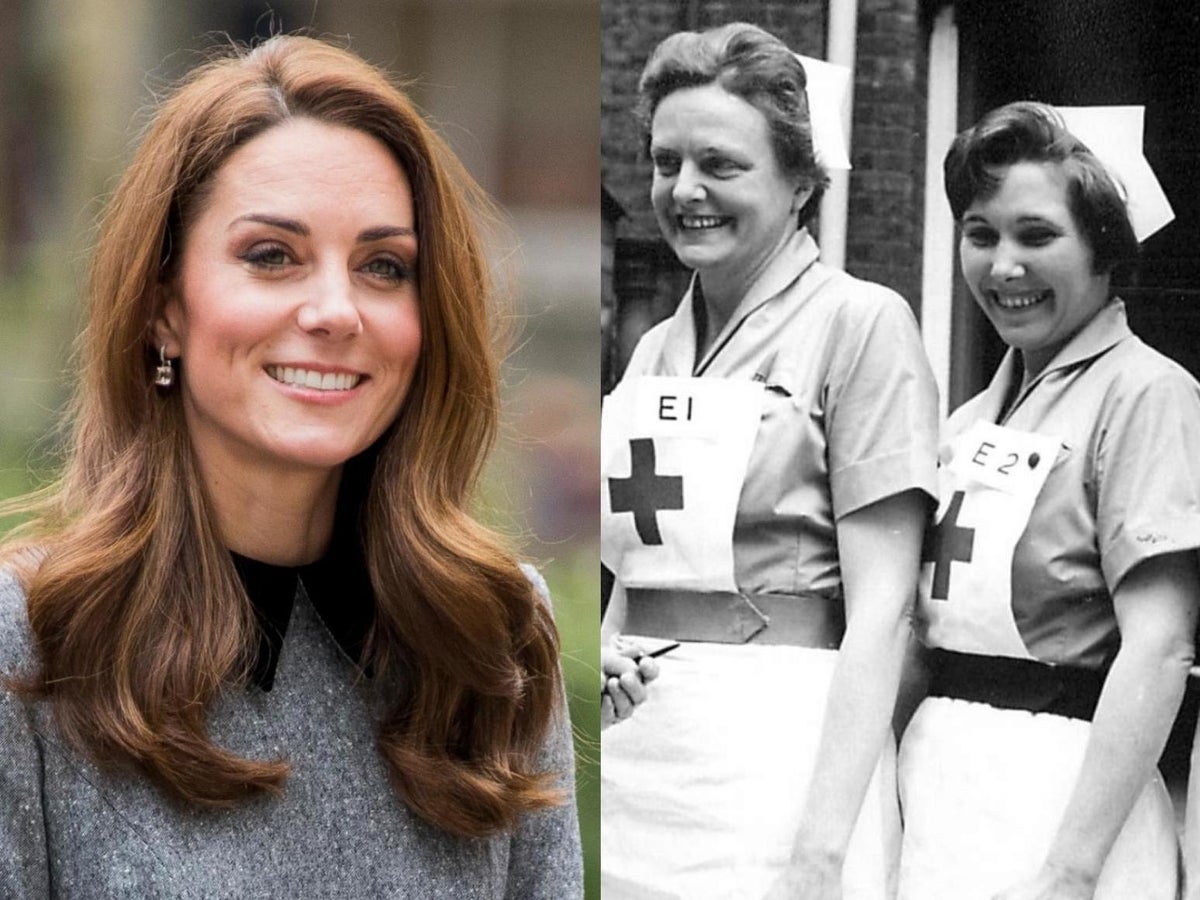 Why do older images of nurses' uniforms have a red cross?