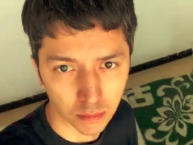 Mr Ghappar was taken to what he said was an epidemic control centre where he was handcuffed to the bed and from where he filmed the video