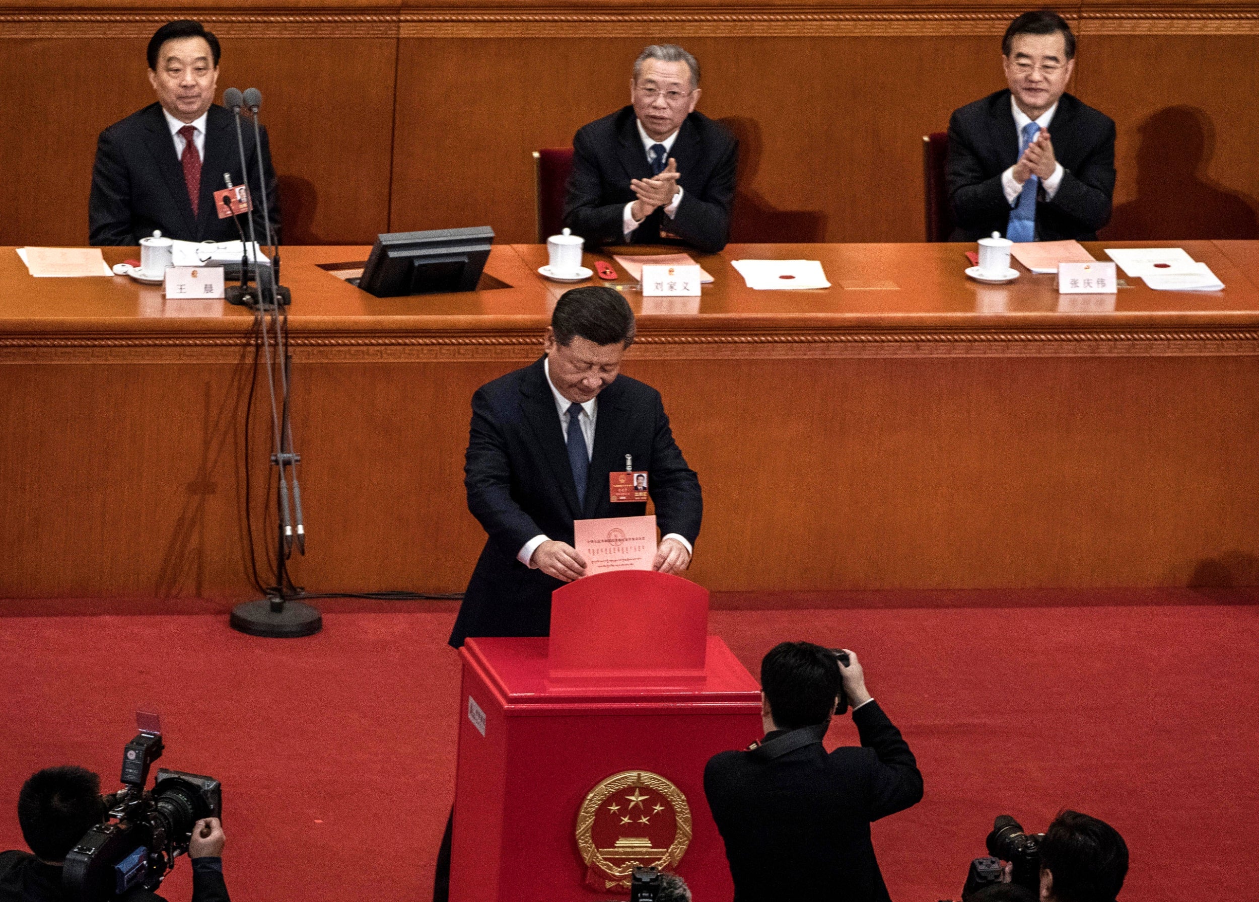 President Xi Jinping votes in favour of abolishing presidential term limits in March, paving the way for him to rule indefinitely