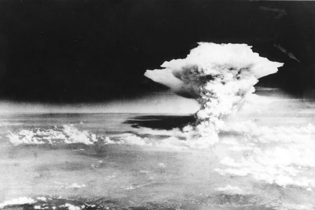 Photograph taken on 6 August 1945 by the US Army and released via the Hiroshima Peace Memorial Museum shows a mushroom cloud caused by the atomic bomb dropped by the B-29 bomber Enola Gay over the city of Hiroshima