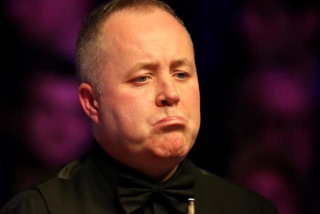 John Higgins is out of the World Championship