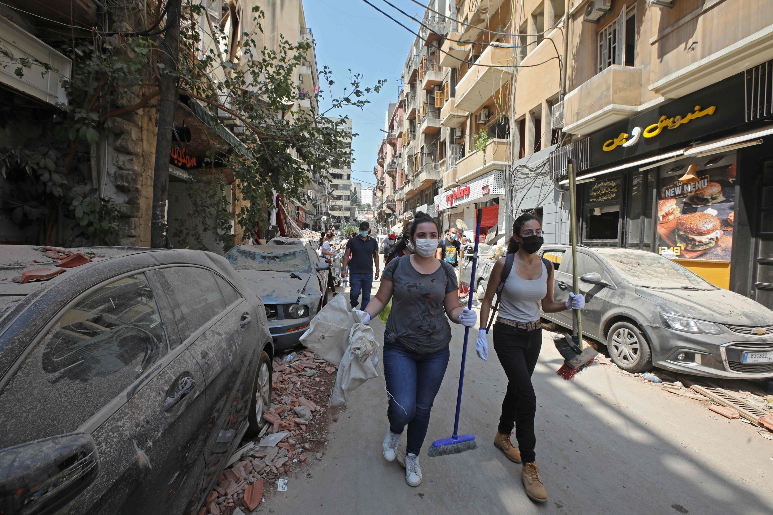 Volunteers arrive on Gouraud Street in the Gemmayze neighbourhood of Beirut to clear debris on 6 August 6, 2020