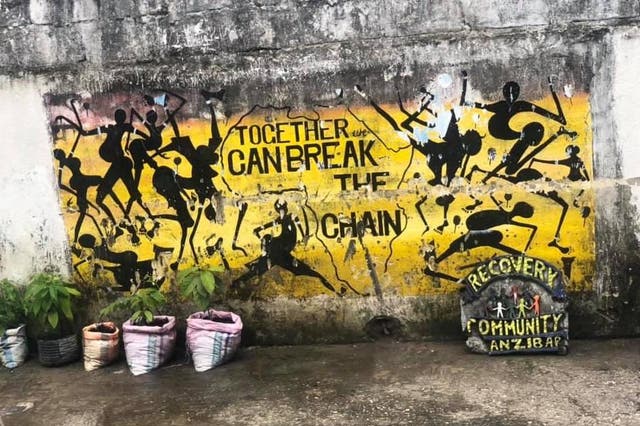An uplifting mural outside a detox centre in Stone Town