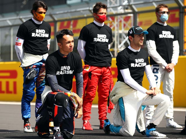 Charles Leclerc has hit out at those who have labelled him a 'racist' for not taking a knee