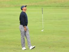 Woods bemoans ‘slow’ greens as Li Haotong leads PGA pack