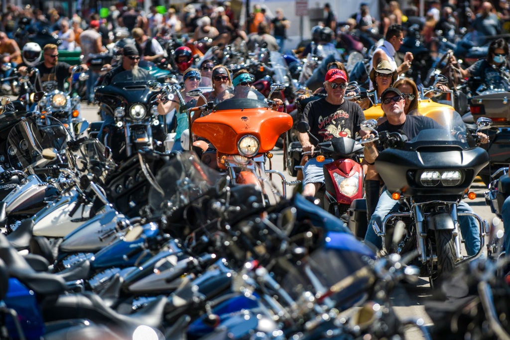Motorcyclists ride down Main Street during the 80th Annual Sturgis Motorcycle Rally on 7 August 2020 in Sturgis, South Dakota