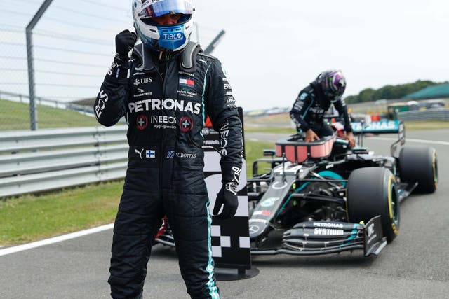 Valtteri Bottas celebrates taking pole position for the F1 70th Anniversary Grand Prix