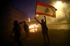 Lebanese protesters storm government buildings as over 110 wounded