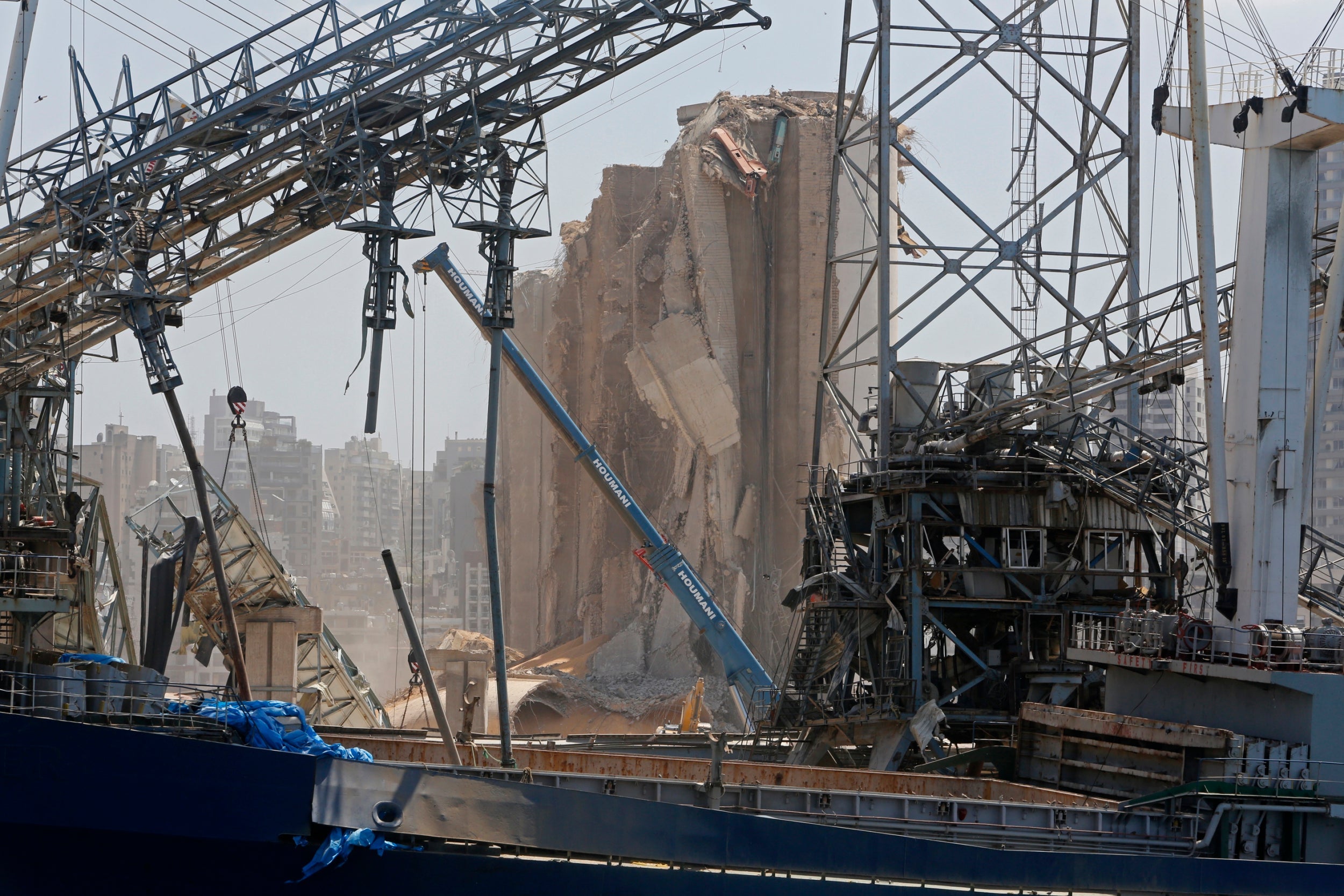 A heavily damaged silo and other structures at the city's port