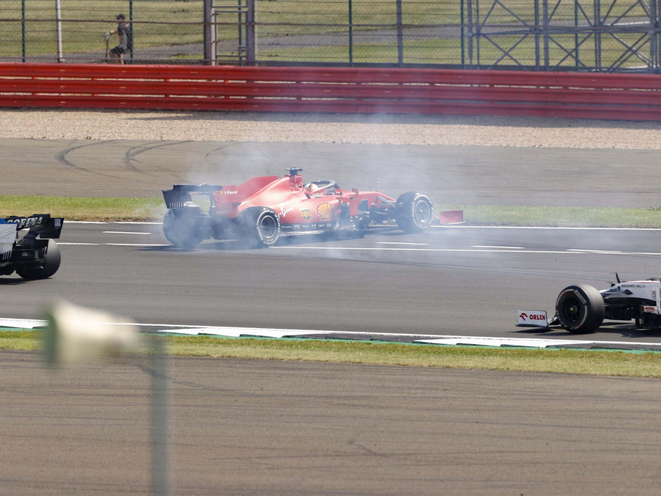 Sebastian Vettel spun off at the first corner as his miserable season continued