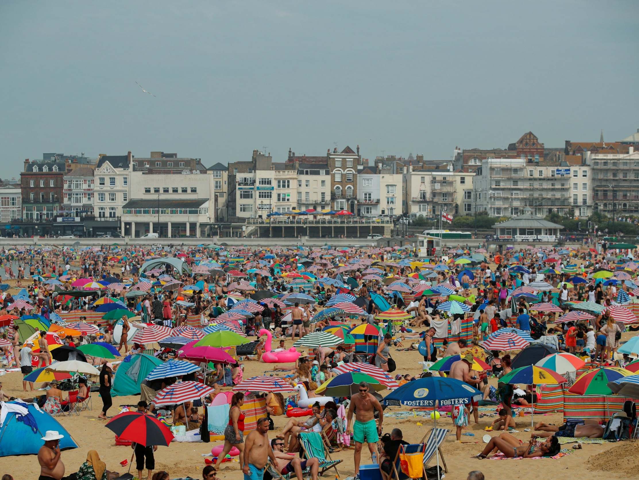 People enjoy the hot weather on Margate beach (Reuters)