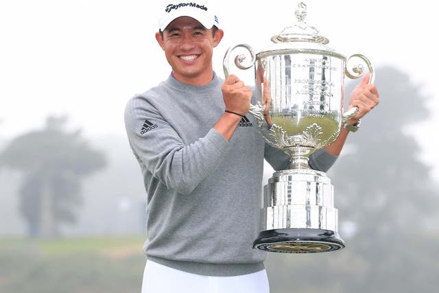 Collin Morikawa celebrates winning the PGA Championship to clinch his first major title