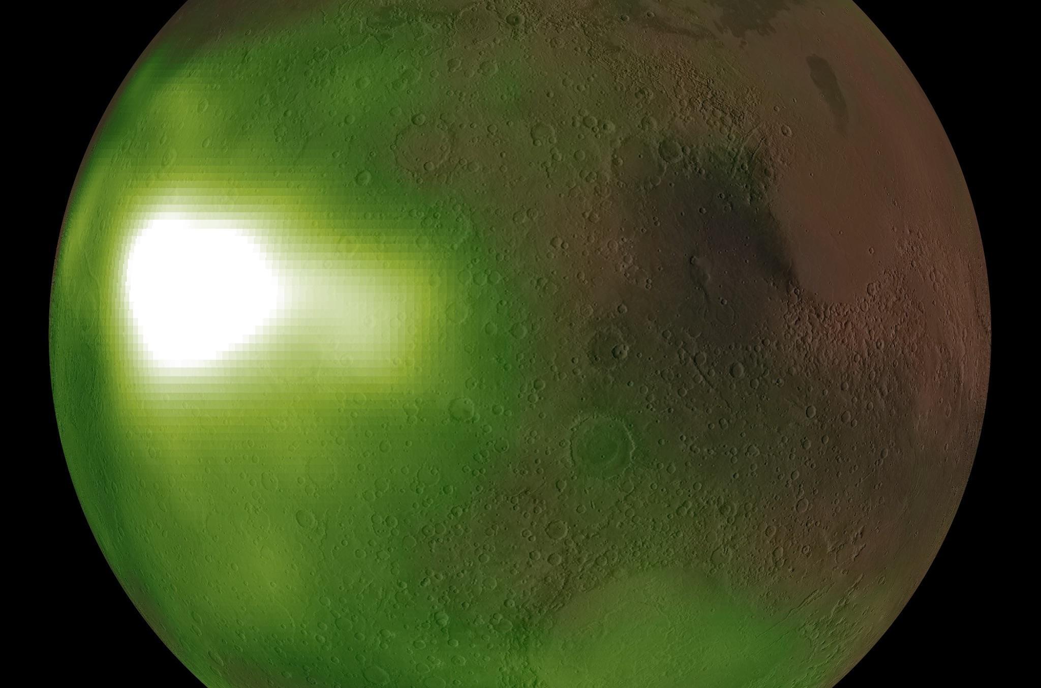 This is an image of the ultraviolet "nightglow" in the Martian atmosphere. Green and white false colors represent the intensity of ultraviolet light, with white being the brightest
