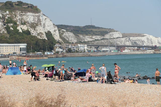 Beachgoers enjoy the hot weather in Dover, Kent, on 9 August, 2020.