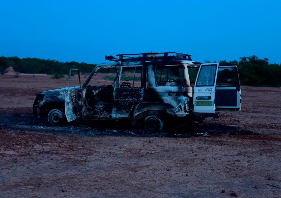 The wreckage of the car where six French aid workers, their local guide and the driver were killed by unidentified gunmen riding motorcycles in an area of southwestern Niger