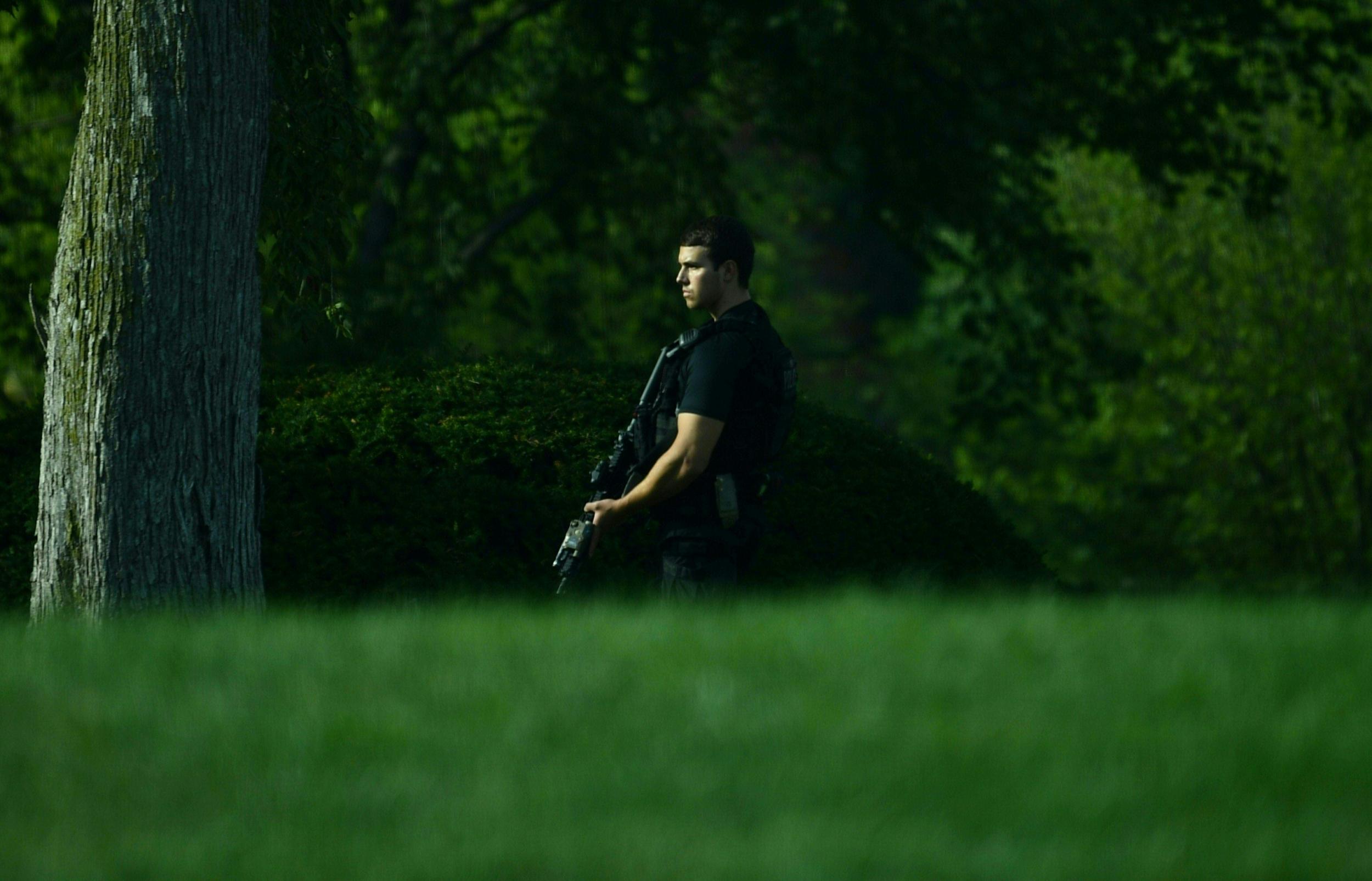 Members of the Secret Service took up positions after a shooting outside of the White House