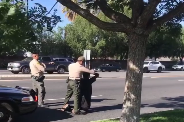 Tammi Collins' son being arrested by police after he and his two friends were allegedly attacked by a homeless man