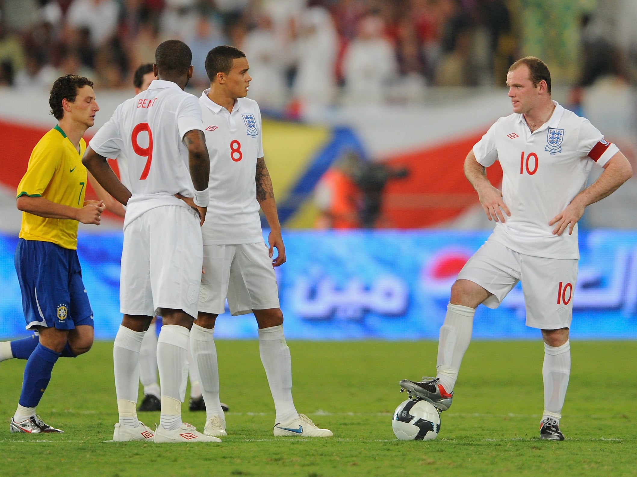 Jermaine Jenas alongside Wayne Rooney and Darren Bent in a friendly against Brazil in 2009