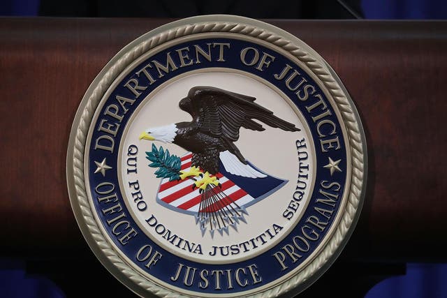 The Justice Department seal is seen on the lectern during a Hate Crimes Subcommittee summit on 29 June 2017 in Washington, DC