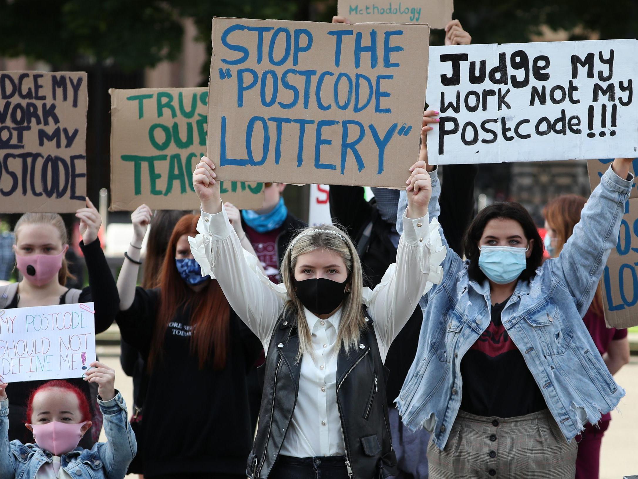 Erin Bleakley (centre) joins protesters in George Square in Glasgow to protest against the Scottish Qualifications Authority (SQA) method of producing exam results this year