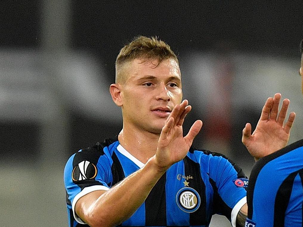 Nicolo Barella celebrates with Lautaro Martinez