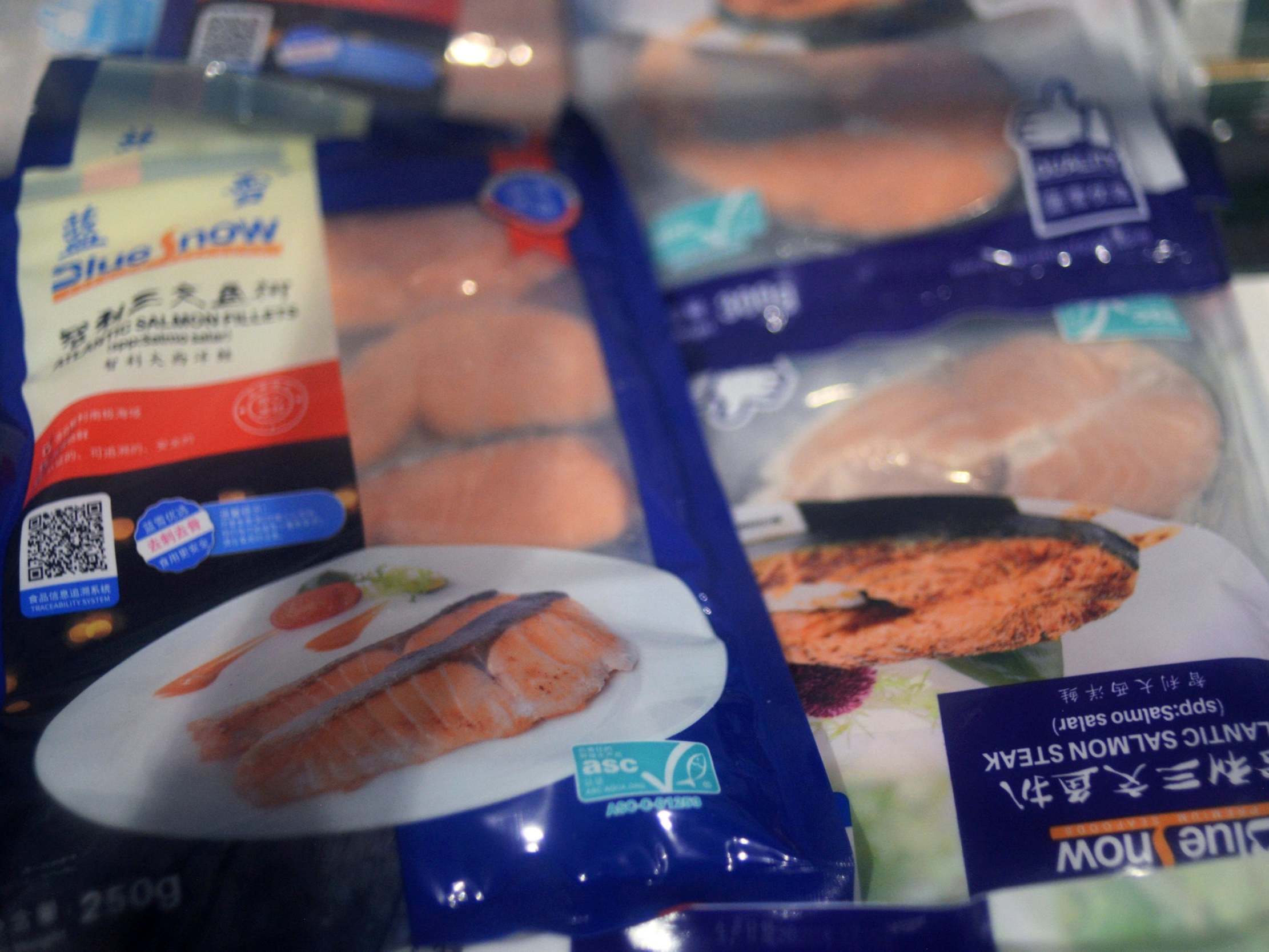 Frozen seafood products made from imported salmon are seen at a Carrefour supermarket, following new cases of coronavirus disease (COVID-19) infections