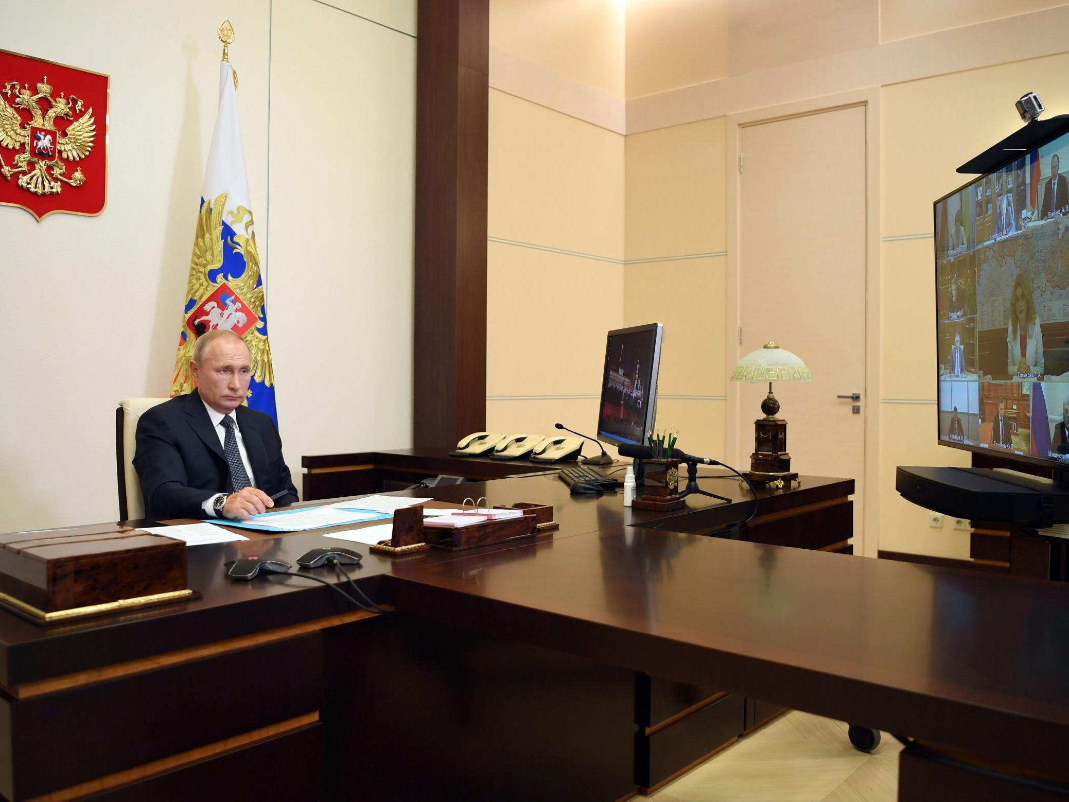 Vladimir Putin chairs a meeting with members of the Russian government yesterday, when he announced that Russia has developed the first vaccine offering sustainable immunity against the coronavirus