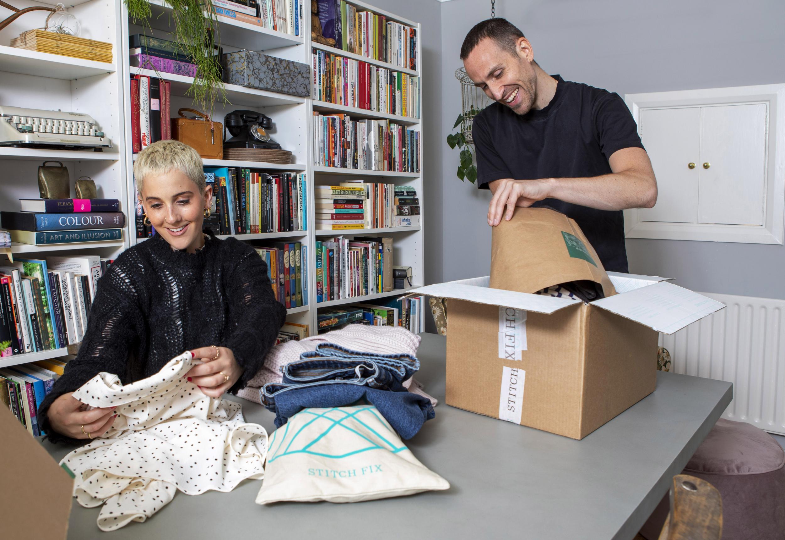 The big reveal: Harriet and Ryan dive into their first Stitch Fix delivery (Adrian Lourie)