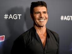 Simon Cowell 'doing spectacularly well' after breaking back, Howie Mandel says