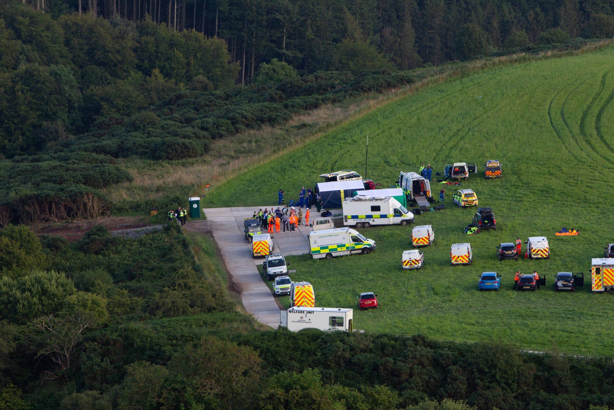 Emergency services in the area of the scene of a derailed passenger train near Stonehaven