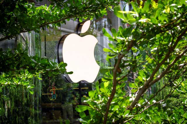 The Apple logo is pictured outside the newly-opened Apple store in downtown Bangkok on July 31, 2020