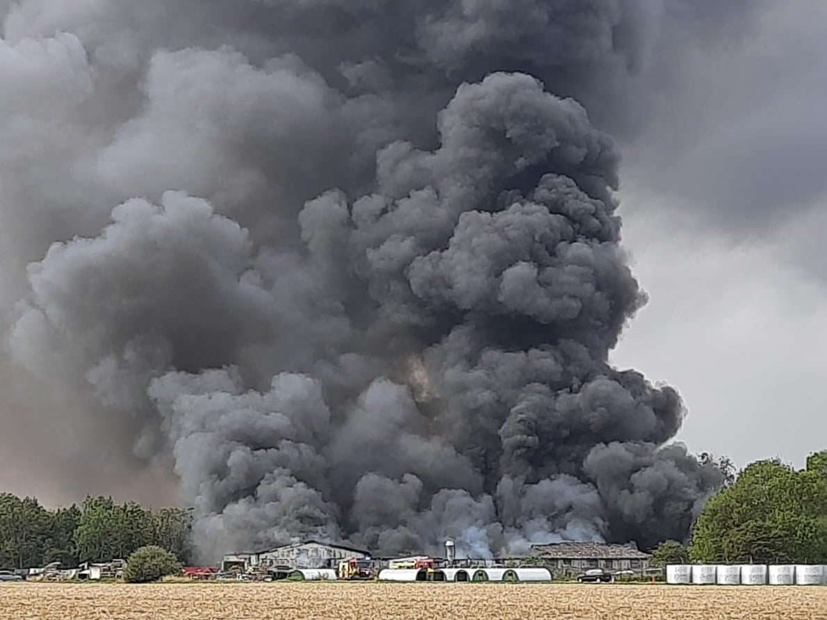 Thick plumes of dark smoke seen at Parham Airfield