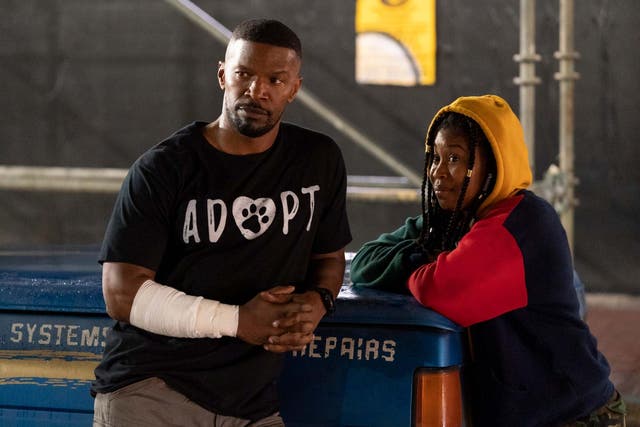 Art (Jamie Foxx) and Robin (Dominique Fishback) in ‘Project Power’
