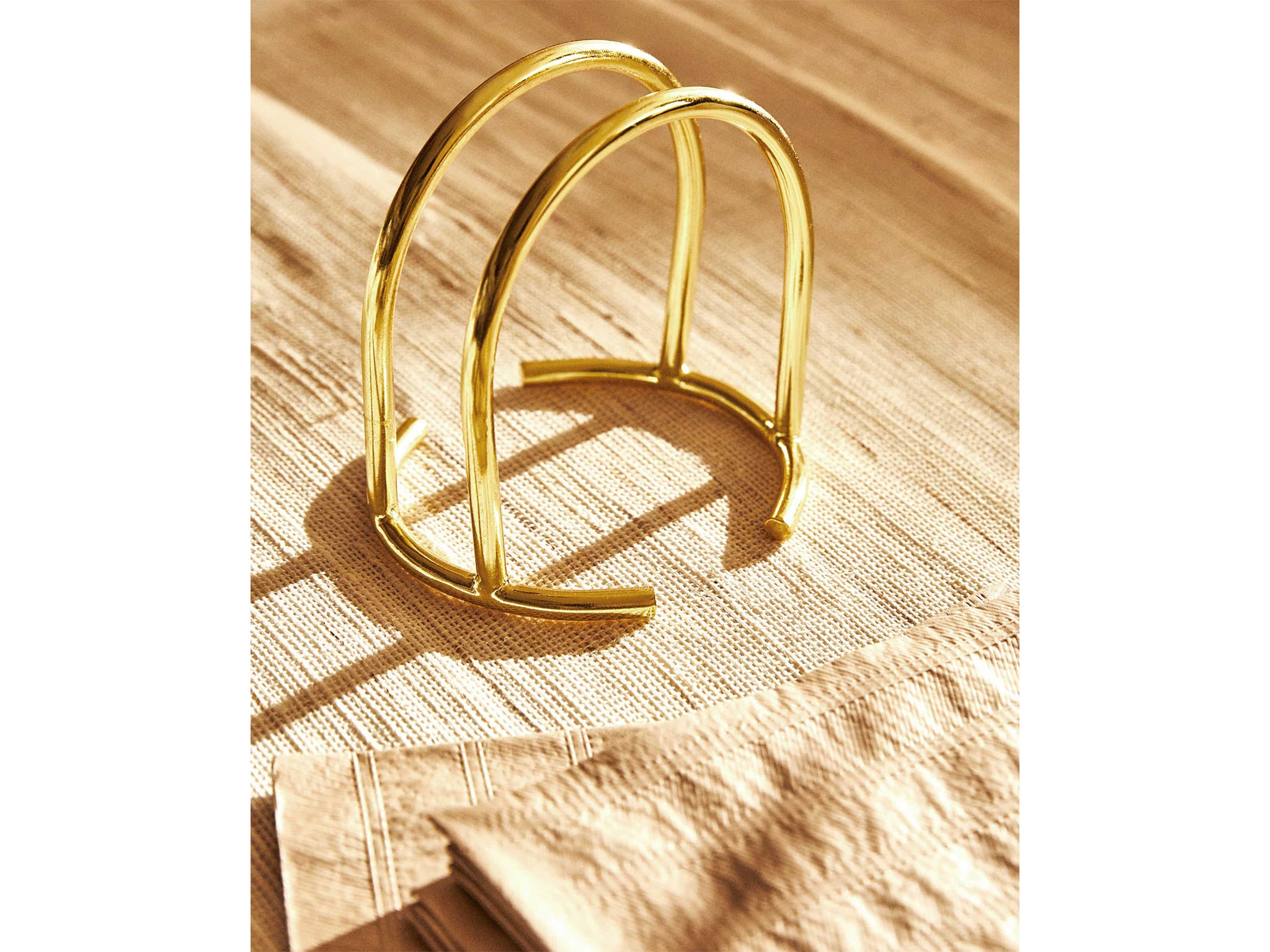 Add a touch of luxury with these gold napkin holders