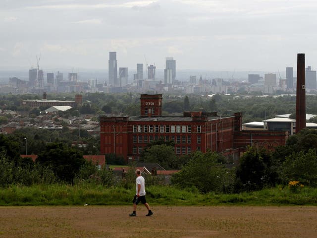 A man takes some exercise in Oldham: Greater Manchester is currently subject to local lockdown restrictions