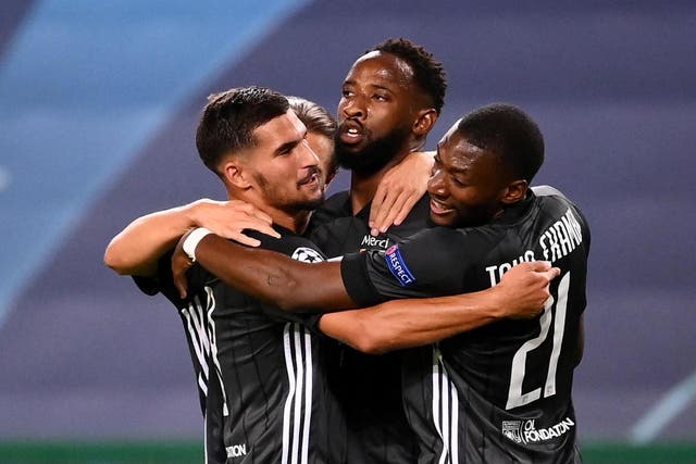 Lyon celebrate after Dembele scores a second