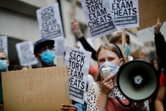 Students protest outside the Department for Education in London on Friday