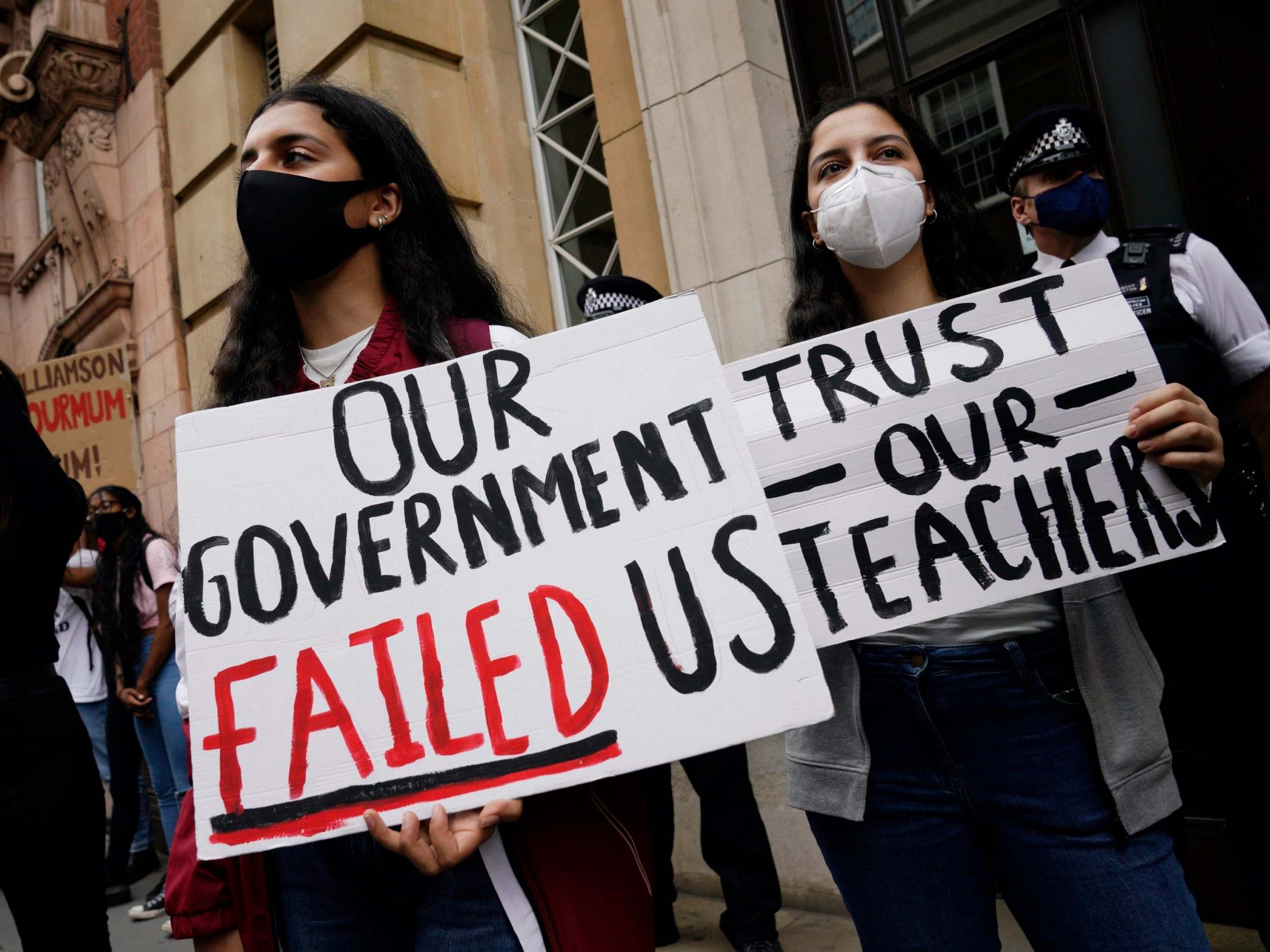 Students protest outside the Department for Education