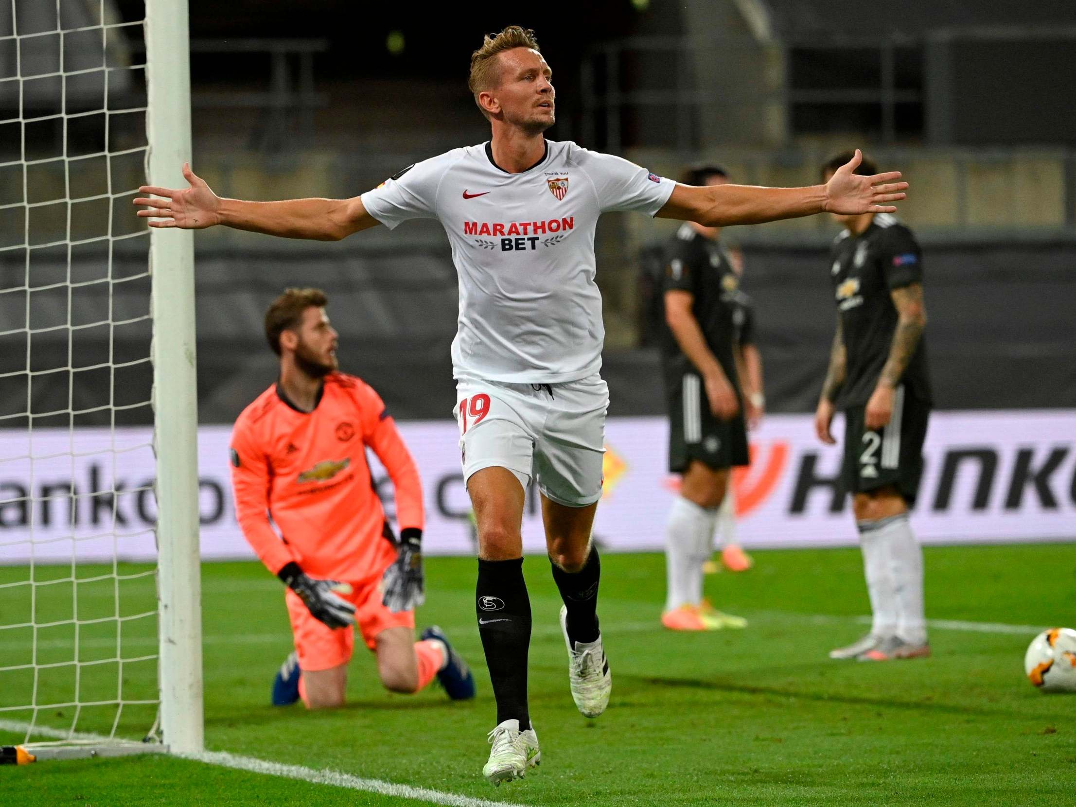 Luuk De Jong celebrates after scoring Sevilla's winning goal