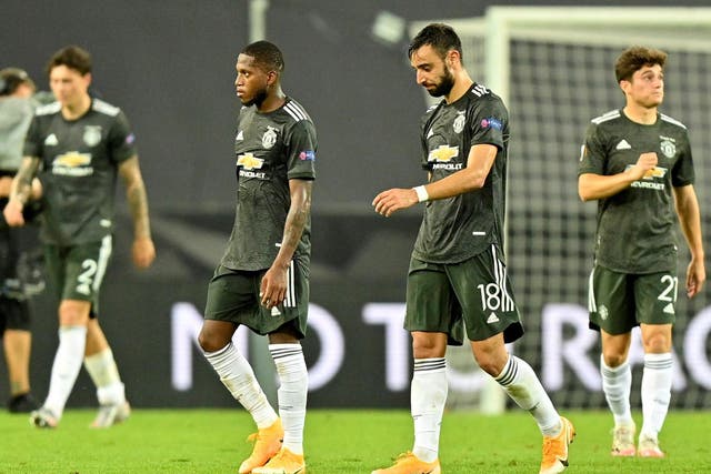 Manchester United's Bruno Fernandes and Fred look dejected