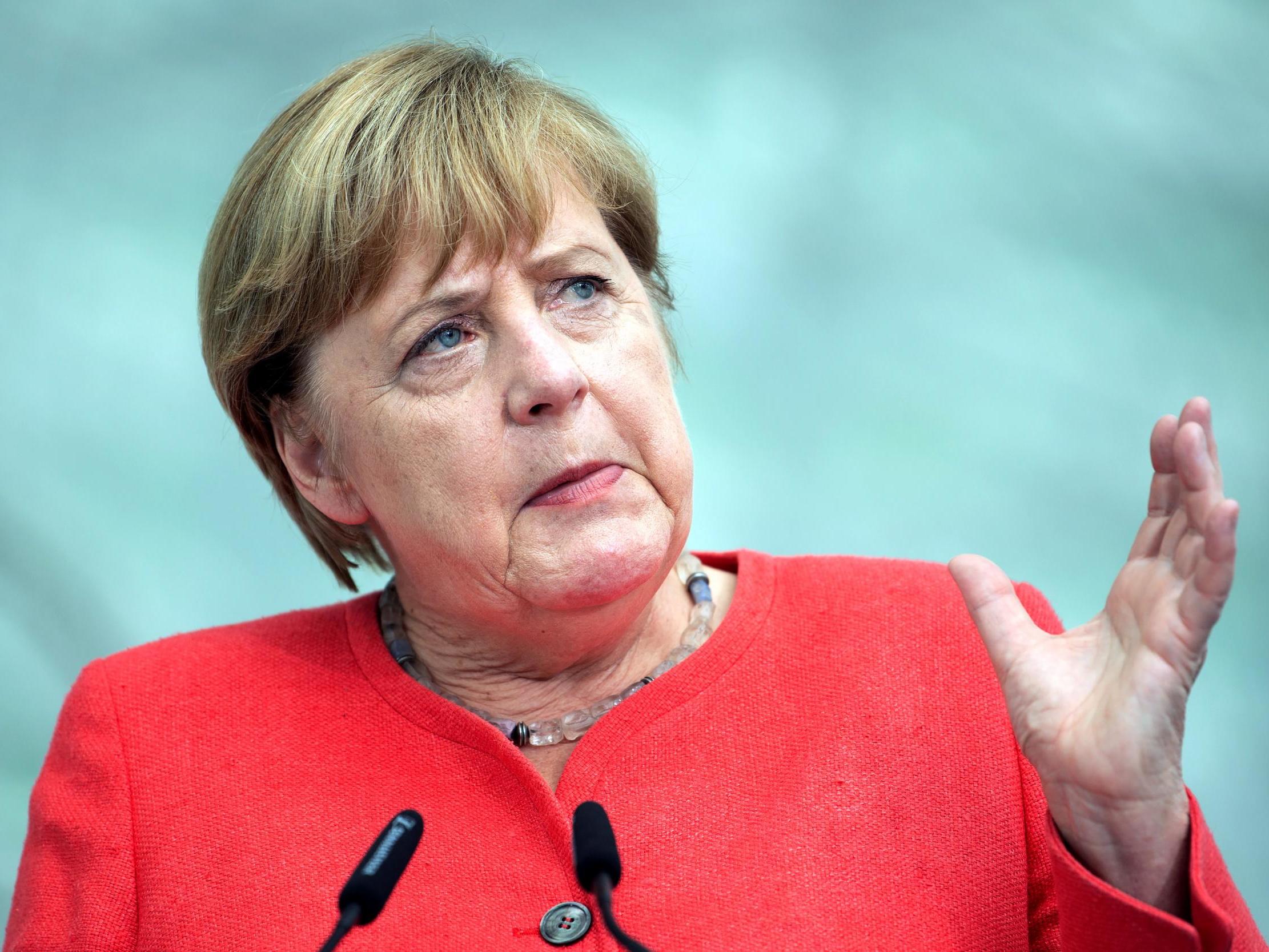 Merkel told journalists in North Rhine-Westphalia that now was not the time to continue easing restrictions