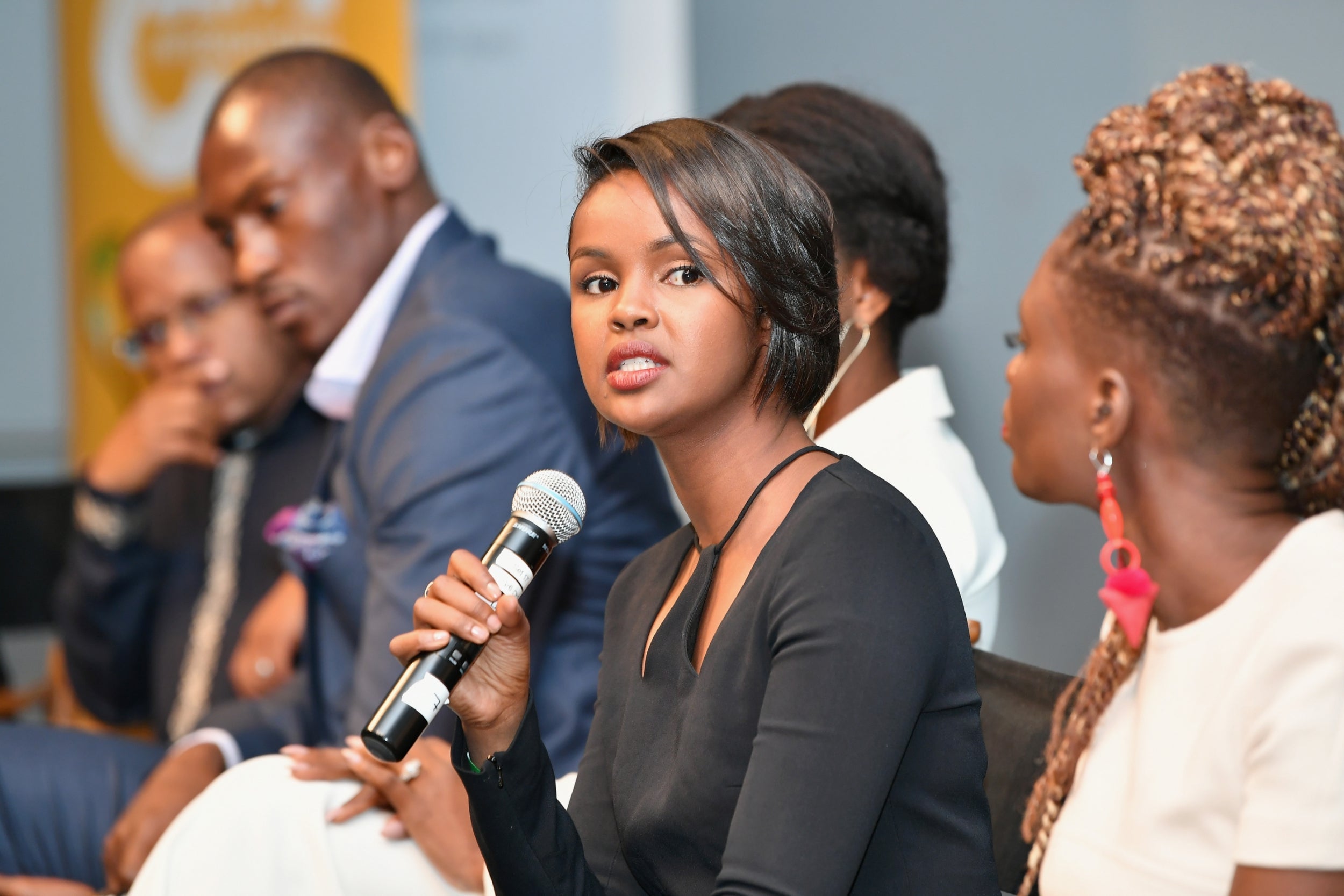 Elman speaking at a BET International panel in 2018