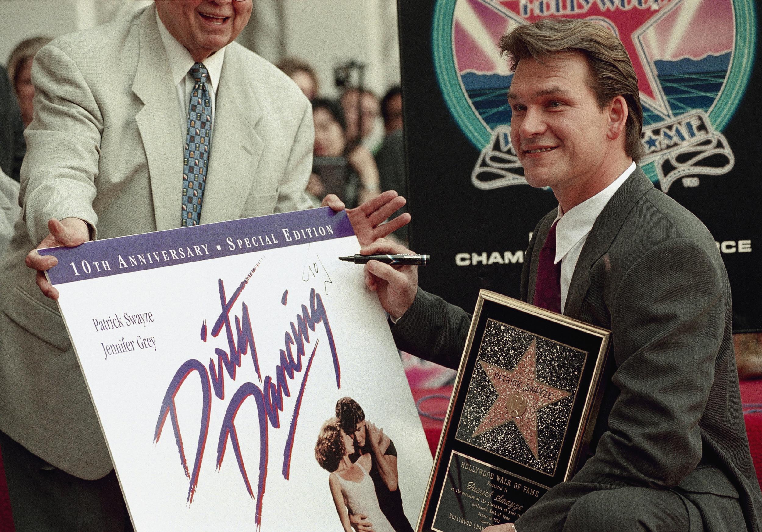 Patrick Swayze after the unveiling of his star on the Hollywood Walk of Fame on 18 August 1997. The event coincided with the 10-year anniversary of the release of 'Dirty Dancing'.