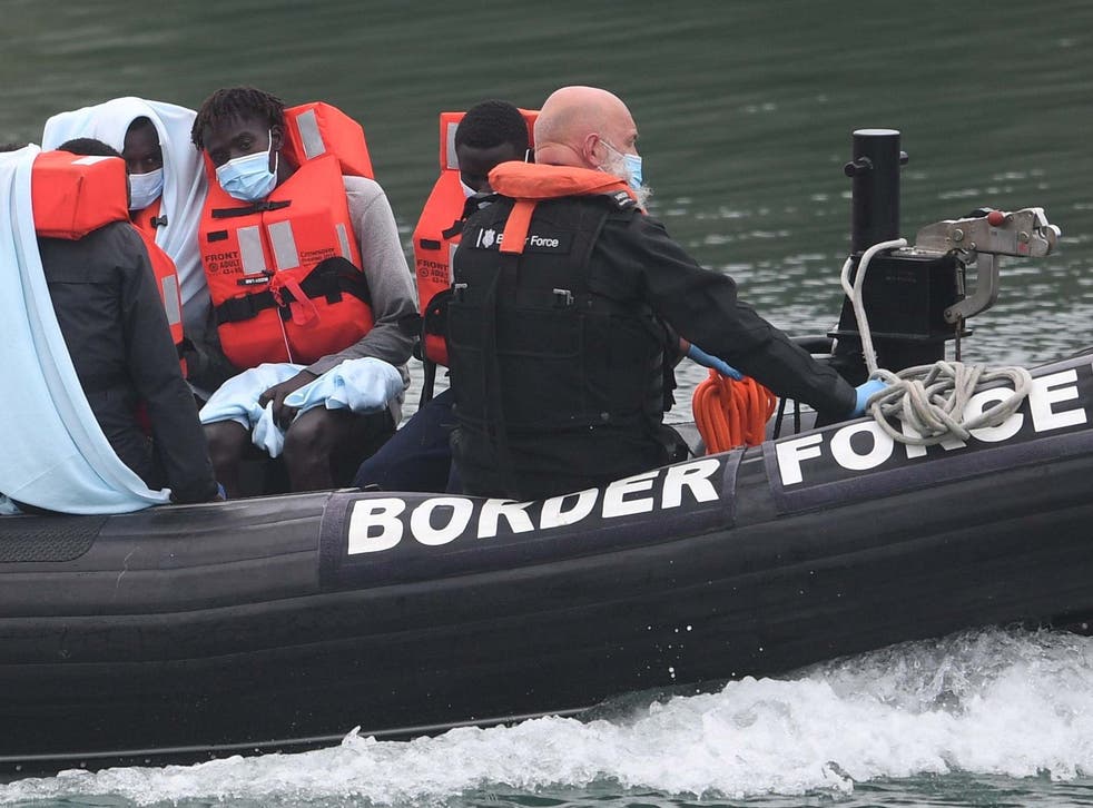 A Border Force vessel brings in migrants found off the coast of Dover on 14 August 2020