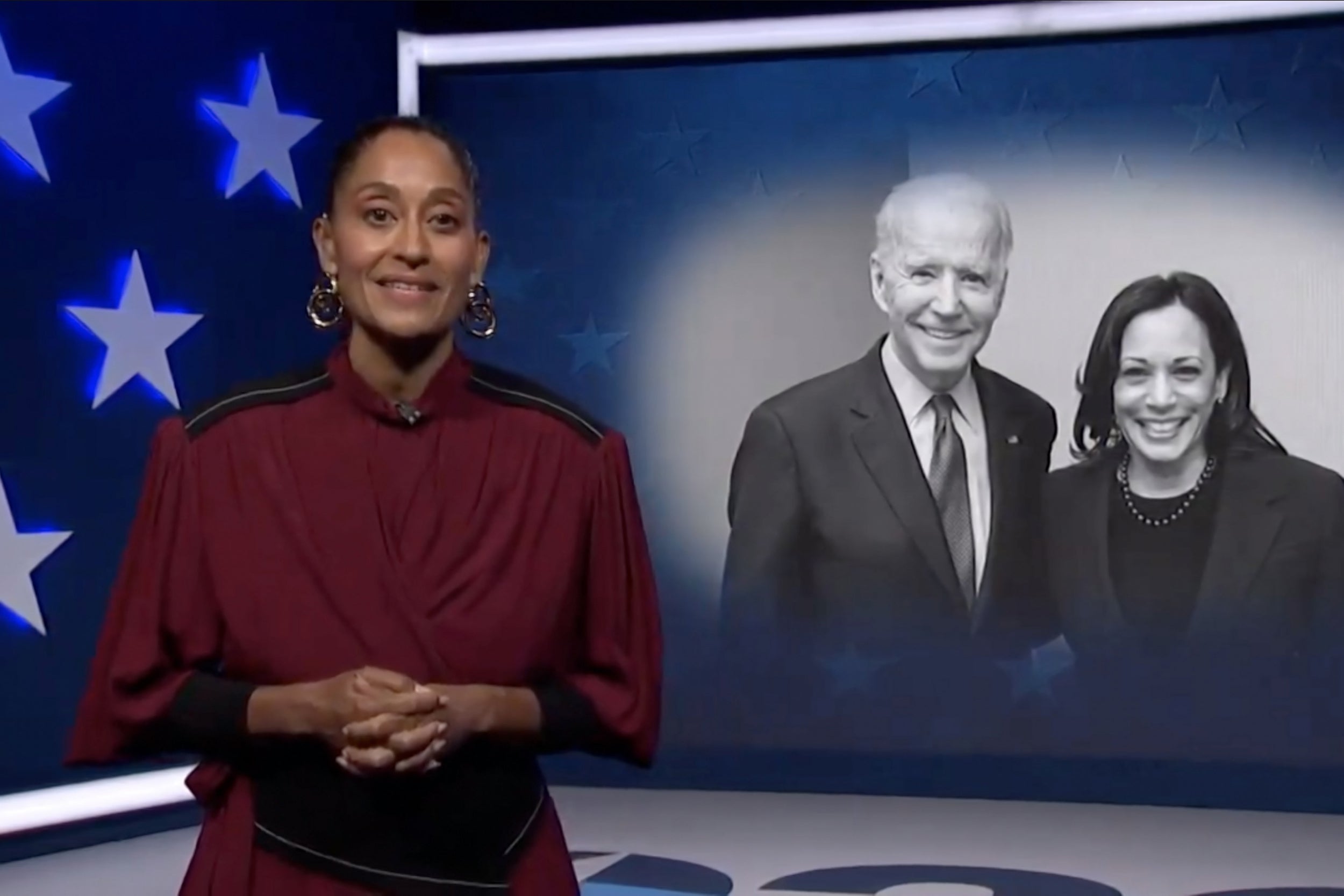 Actress and activist Tracee Ellis Ross speaks in front of photo of Presumptive Democratic presidential nominee former Vice President Joe Biden and Presumptive Democratic vice presidential nominee Kamala Harris at the Democratic National Convention