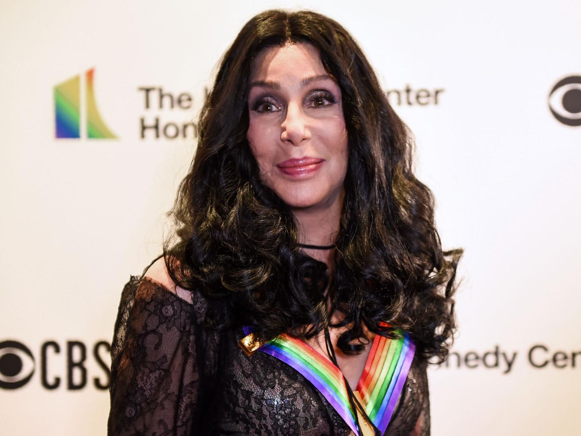 Cher attempts to volunteer with USPS as she accuses Trump ...