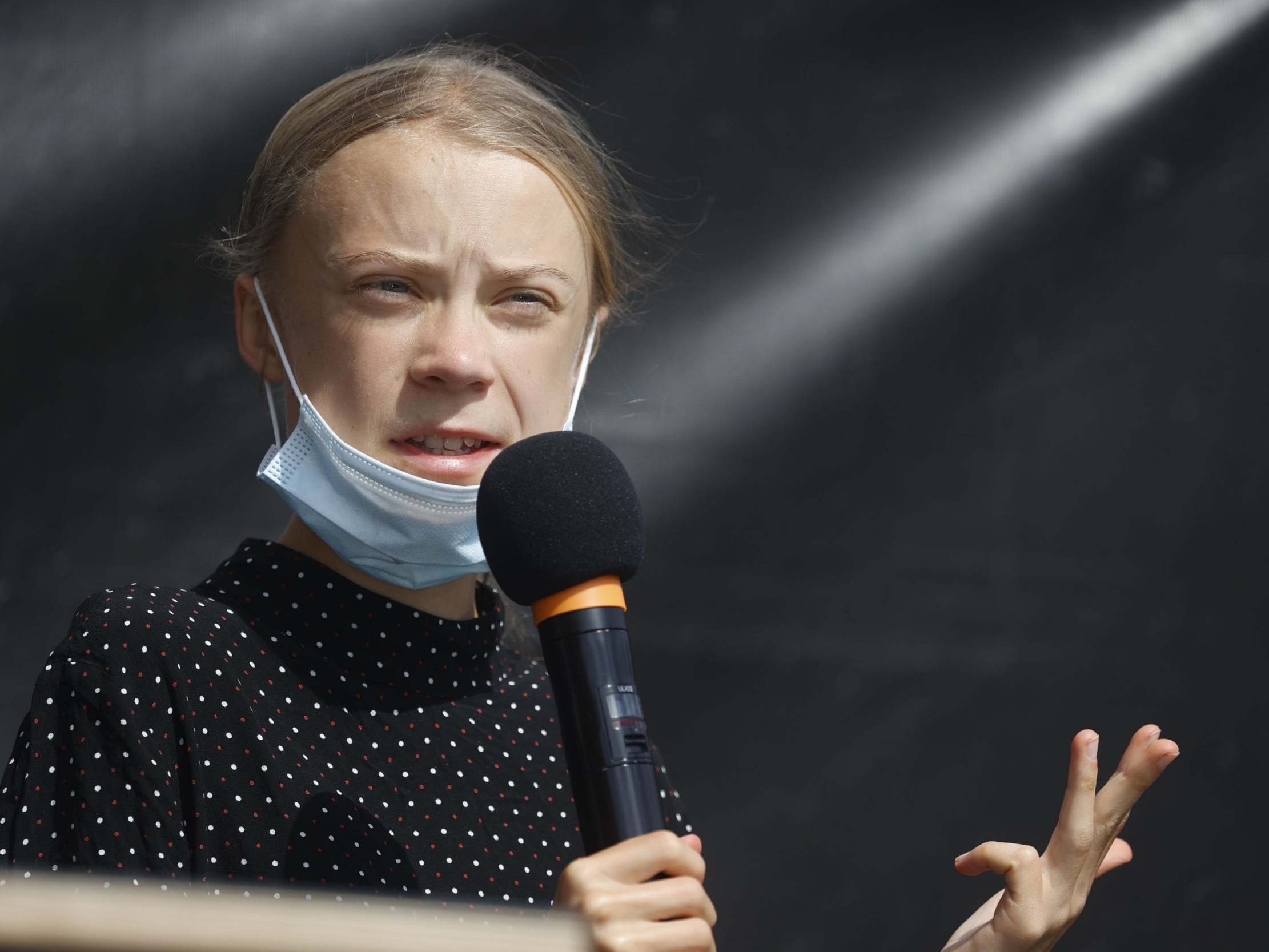 Greta Thunberg addresses an audience including German Chancellor Angela Merkel in Berlin on 20 August 2020